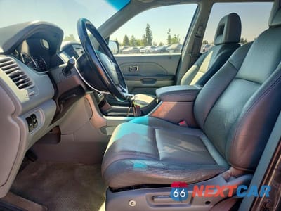 Zdjęcie 7 z 13 samochodu: 2003 HONDA PILOT EXL VIN:2HKYF18573H550665 - miniatura
