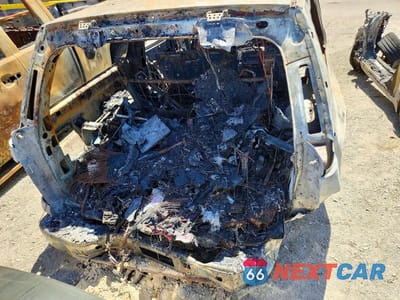 Zdjęcie 6 z 13 samochodu: 2003 GMC YUKON XL C1500 VIN:1GKEC16T83J244213 - miniatura
