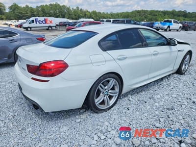 Trzecie zdjęcie samochodu z tyłu: 2014 BMW 640 XI GRAN COUPE VIN:WBA6B8C57ED452843 - miniatura