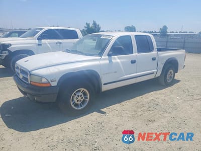 2000 DODGE DAKOTA QUAD 1B7GL2AZ4YS672495 - główne zdjęcie licytacji z USA - miniatura