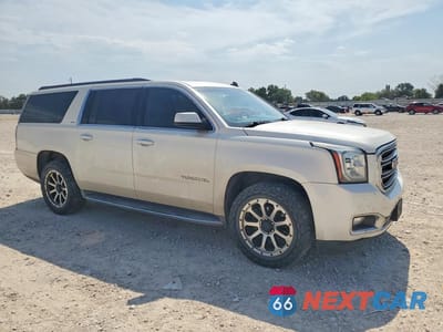 Czwarte zdjęcie samochodu z boku: 2015 GMC YUKON C1500 SLT VIN:1GKS1HKC0FR163364 - miniatura