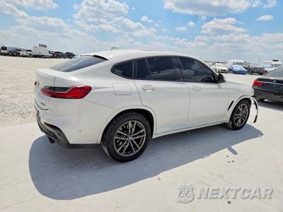 Trzecie zdjęcie samochodu z tyłu: 2021 BMW X4 XDRIVE30I VIN:5UX2V1C08M9E99791 - miniatura