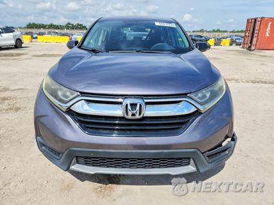 Piąte zdjęcie samochodu w środku: 2019 HONDA CR-V LX VIN:2HKRW5H3XKH410201 - miniatura
