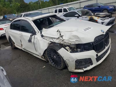 Czwarte zdjęcie samochodu z boku: 2022 BMW 750 XI VIN:WBA7U2C04NCH44975 - miniatura