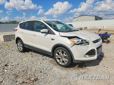 Czwarte zdjęcie samochodu z boku: 2014 FORD ESCAPE TITANIUM VIN:1FMCU0J90EUB14896 - miniatura