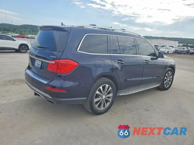 Trzecie zdjęcie samochodu z tyłu: 2013 MERCEDES-BENZ GL 450 4MATIC VIN:4JGDF7CE6DA144955 - miniatura