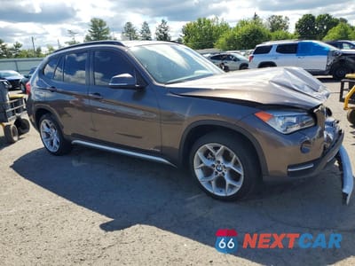 Czwarte zdjęcie samochodu z boku: 2013 BMW X1 XDRIVE28I VIN:WBAVL1C59DVR82045 - miniatura