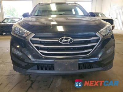 Piąte zdjęcie samochodu w środku: 2016 HYUNDAI TUCSON SE VIN:KM8J3CA43GU146843 - miniatura