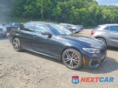 Czwarte zdjęcie samochodu z boku: 2021 BMW M340XI VIN:3MW5U9J02M8B53937 - miniatura