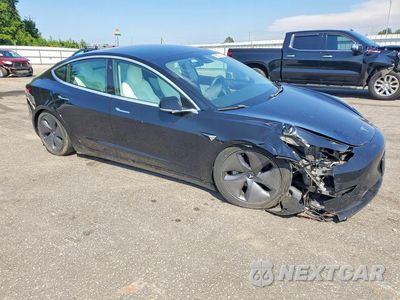 Czwarte zdjęcie samochodu z boku: 2020 TESLA MODEL 3 VIN:5YJ3E1EA5LF793131 - miniatura