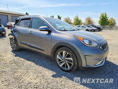 Czwarte zdjęcie samochodu z boku: 2017 KIA NIRO EX TOURING VIN:KNDCE3LC9H5042560 - miniatura