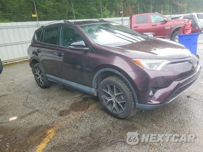Czwarte zdjęcie samochodu z boku: 2017 TOYOTA RAV4 SE VIN:2T3JFREV8HW587857 - miniatura