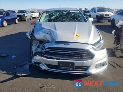 Piąte zdjęcie samochodu w środku: 2016 FORD FUSION SE HYBRID VIN:3FA6P0LU0GR316289 - miniatura