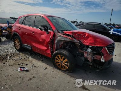 Czwarte zdjęcie samochodu z boku: 2016 MAZDA CX-5 SPORT VIN:JM3KE2BY9G0767842 - miniatura
