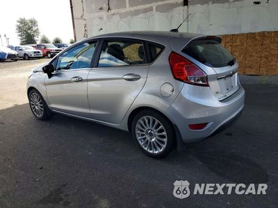 Drugie zdjęcie samochodu z przodu: 2014 FORD FIESTA TITANIUM VIN:3FADP4FJ8EM122880 - miniatura