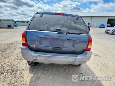 Zdjęcie 6 z 13 samochodu: 2000 JEEP GRAND CHEROKEE LAREDO VIN:1J4GW48S4YC409567 - miniatura