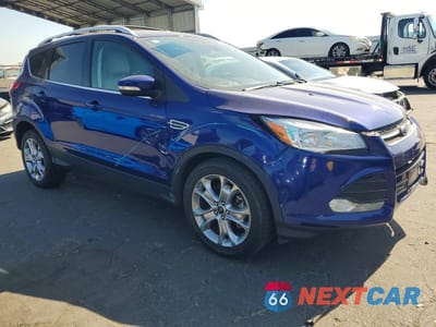 Czwarte zdjęcie samochodu z boku: 2014 FORD ESCAPE TITANIUM VIN:1FMCU9J98EUB09191 - miniatura