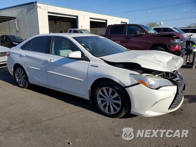 Czwarte zdjęcie samochodu z boku: 2015 TOYOTA CAMRY HYBRID XLE VIN:4T1BD1FK4FU155286 - miniatura