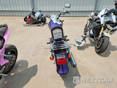 Czwarte zdjęcie samochodu z boku: 2002 KAWASAKI VN800 B VIN:JKBVNCB162B514804 - miniatura