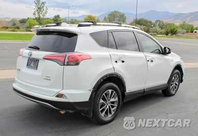 Trzecie zdjęcie samochodu z tyłu: 2017 TOYOTA RAV4 HYBRID XLE VIN:JTMRJREV3HD104354 - miniatura
