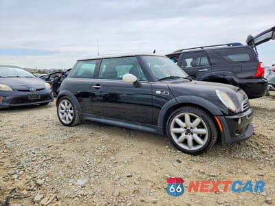 Czwarte zdjęcie samochodu z boku: 2003 MINI COOPER S VIN:WMWRE33433TD60732 - miniatura