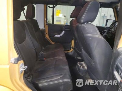 Zdjęcie 11 z 13 samochodu: 2013 JEEP WRANGLER UNLIMITED SAHARA VIN:1C4BJWEG2DL646028 - miniatura