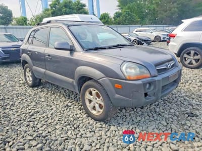 Czwarte zdjęcie samochodu z boku: 2009 HYUNDAI TUCSON SE VIN:KM8JN72D09U943909 - miniatura