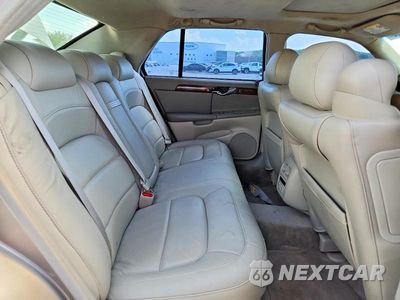 Zdjęcie 10 z 12 samochodu: 2004 CADILLAC DEVILLE VIN:1G6KD54Y54U155624 - miniatura