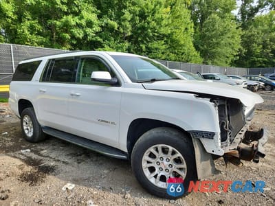 Czwarte zdjęcie samochodu z boku: 2015 GMC YUKON XL K1500 SLE VIN:1GKS2GKC6FR191032 - miniatura
