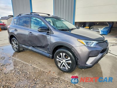 Czwarte zdjęcie samochodu z boku: 2018 TOYOTA RAV4 LE VIN:2T3BFREV5JW751866 - miniatura