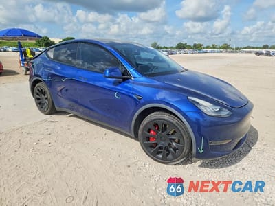 Czwarte zdjęcie samochodu z boku: 2020 TESLA MODEL Y VIN:5YJYGDEF1LF000470 - miniatura