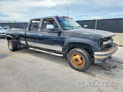 Czwarte zdjęcie samochodu z boku: 2000 GMC SIERRA K3500 VIN:1GTHK33J1YF453961 - miniatura