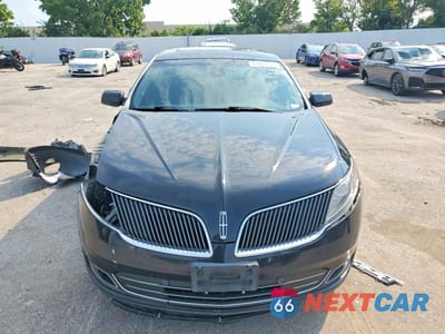 Piąte zdjęcie samochodu w środku: 2016 LINCOLN MKS VIN:1LNHL9FT6GG600891 - miniatura