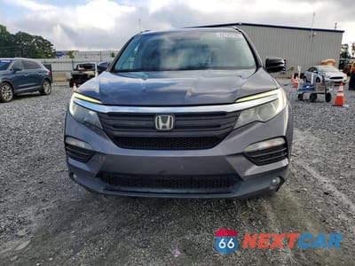 Piąte zdjęcie samochodu w środku: 2016 HONDA PILOT TOURING VIN:5FNYF5H95GB039180 - miniatura