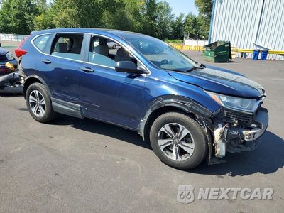 Czwarte zdjęcie samochodu z boku: 2018 HONDA CR-V LX VIN:2HKRW6H30JH207189 - miniatura