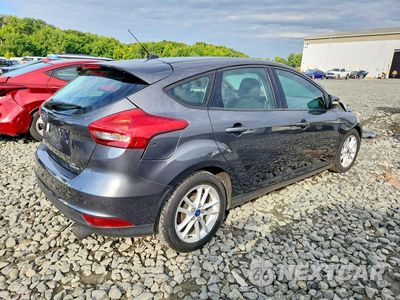 Trzecie zdjęcie samochodu z tyłu: 2016 FORD FOCUS SE VIN:1FADP3K28GL406586 - miniatura