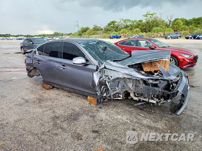 Czwarte zdjęcie samochodu z boku: 2014 INFINITI Q50 PREMIUM VIN:JN1BV7AR3EM690233 - miniatura
