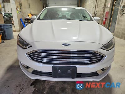 Piąte zdjęcie samochodu w środku: 2017 FORD FUSION SE VIN:3FA6P0HD6HR347587 - miniatura