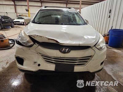 Piąte zdjęcie samochodu w środku: 2012 HYUNDAI TUCSON GLS VIN:KM8JU3AC4CU516101 - miniatura