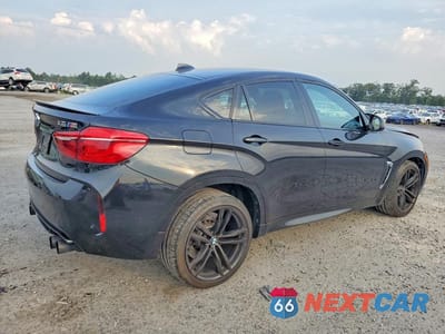 Trzecie zdjęcie samochodu z tyłu: 2017 BMW X6 M VIN:5YMKW8C30H0U72181 - miniatura