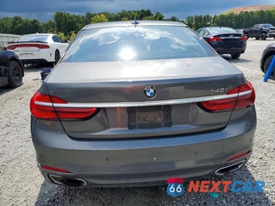 Zdjęcie 6 z 12 samochodu: 2016 BMW 740 I VIN:WBA7E2C5XGG714526 - miniatura