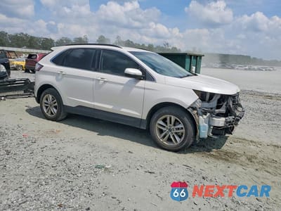 Czwarte zdjęcie samochodu z boku: 2017 FORD EDGE SEL VIN:2FMPK3J97HBB46263 - miniatura