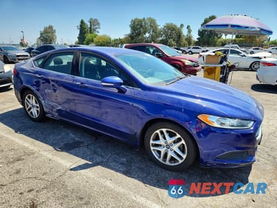 Czwarte zdjęcie samochodu z boku: 2016 FORD FUSION SE VIN:1FA6P0H75G5116840 - miniatura