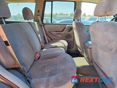Zdjęcie 11 z 13 samochodu: 1999 JEEP GRAND CHEROKEE LAREDO VIN:1J4GW58S5XC687799 - miniatura