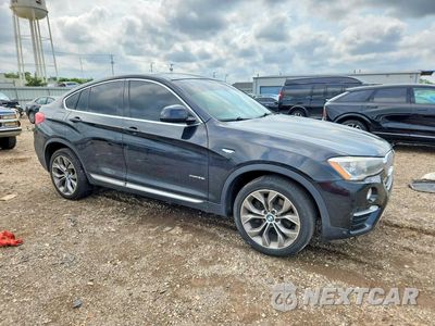 Czwarte zdjęcie samochodu z boku: 2015 BMW X4 XDRIVE28I VIN:5UXXW3C58F0F89105 - miniatura