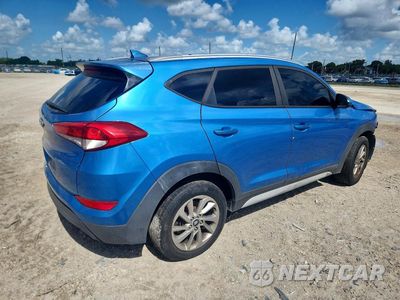 Trzecie zdjęcie samochodu z tyłu: 2018 HYUNDAI TUCSON VIN:KM8J33A40JU726686 - miniatura