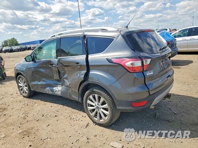 Drugie zdjęcie samochodu z przodu: 2017 FORD ESCAPE TITANIUM VIN:1FMCU9J98HUB78502 - miniatura