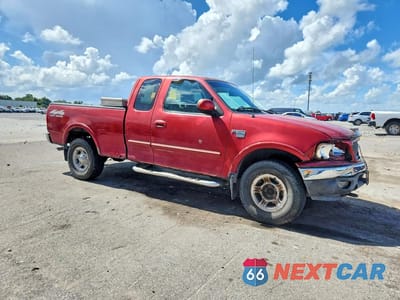 Czwarte zdjęcie samochodu z boku: 1999 FORD F150 VIN:1FTRX18L3XNA54946 - miniatura