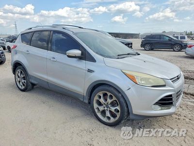 Czwarte zdjęcie samochodu z boku: 2014 FORD ESCAPE TITANIUM VIN:1FMCU0J93EUA38994 - miniatura