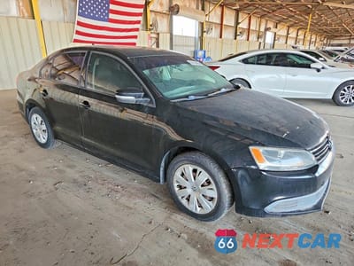Czwarte zdjęcie samochodu z boku: 2014 VOLKSWAGEN JETTA SE VIN:3VWD17AJ5EM403231 - miniatura